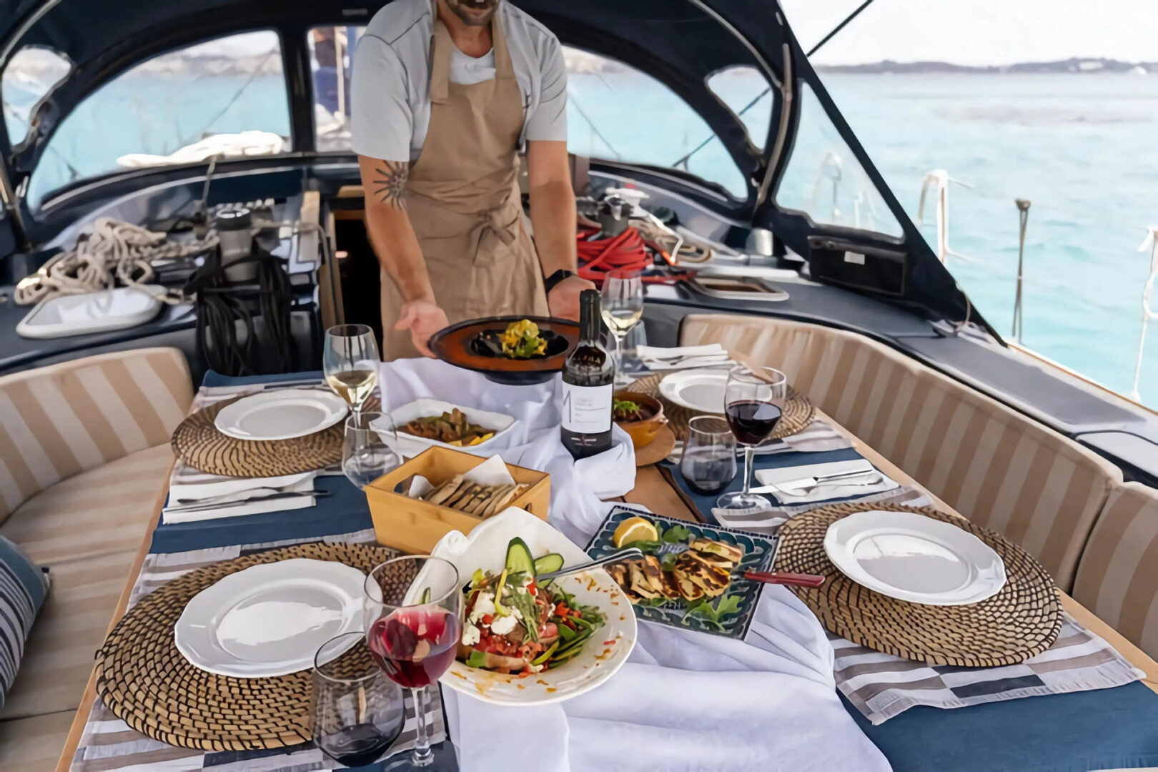 A beautifully set dining table on the Alfayacht 56 during the Gastronomy Sailing Cruise in Athens Riviera by Events on Board.