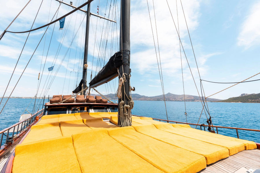 Sail the Saronic Gulf on a 78ft schooner, exploring the stunning islands of Agistri, Moni & Aegina with crystal-clear waters, scenic landscapes, and rich history with Events on Board