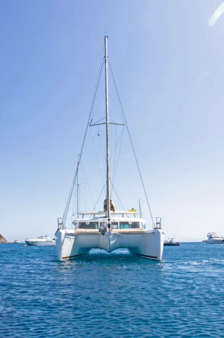 A front view of the Lagoon 420 Catamaran sailing smoothly in the Aegean Sea, perfect for a hen party adventure with Events on Board.