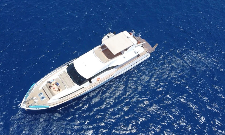 Mykonos Day Cruise with Tecnomarine 92 | Delos, Rhenia & South Coast Beaches Golden Yachting and Sailing