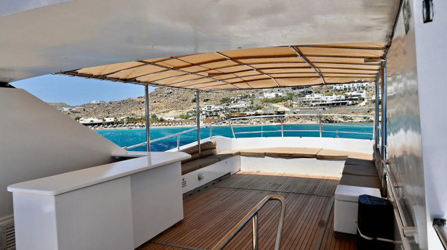 Mykonos Day Cruise with Tecnomarine 92 | Delos, Rhenia & South Coast Beaches Golden Yachting and Sailing