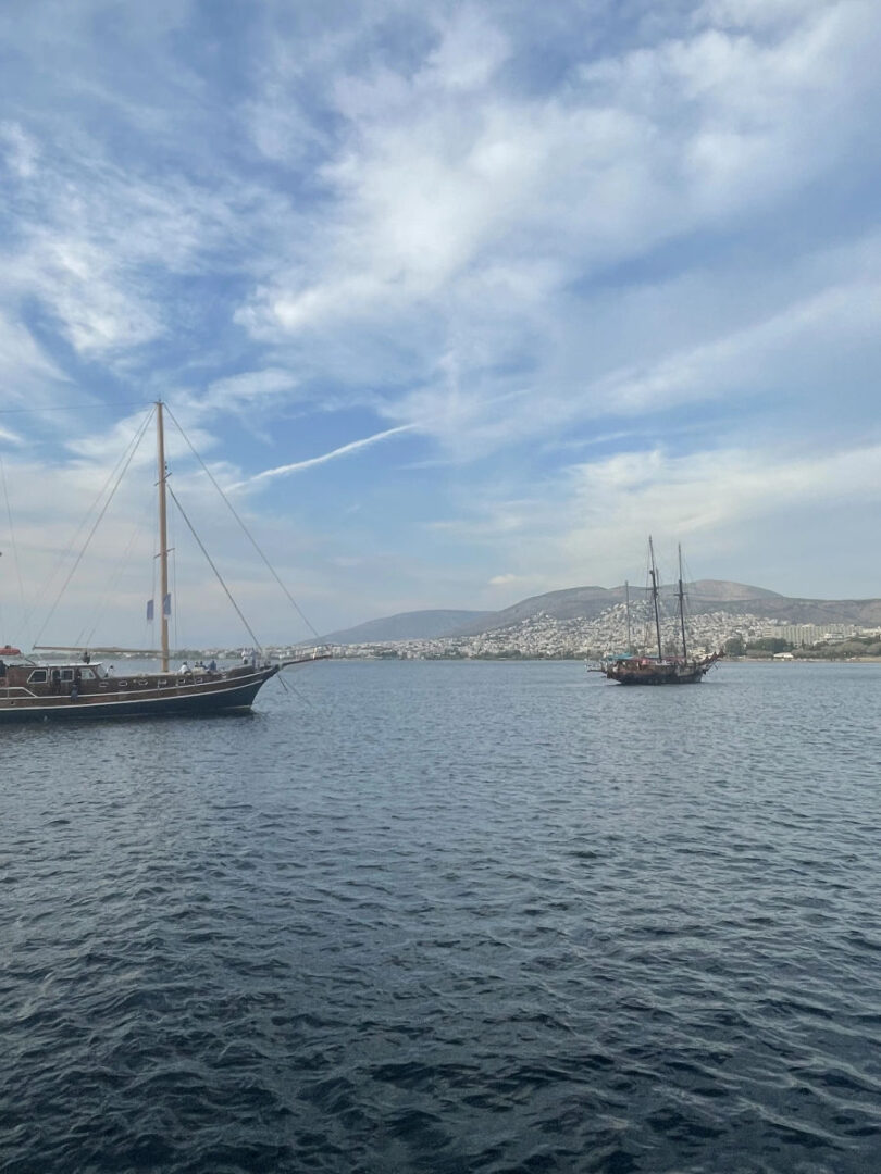 Wide-angle shot of traditional Greek gulets in the Aegean Sea near Athens during the Wooden Regatta Event, organized by Events on Board.